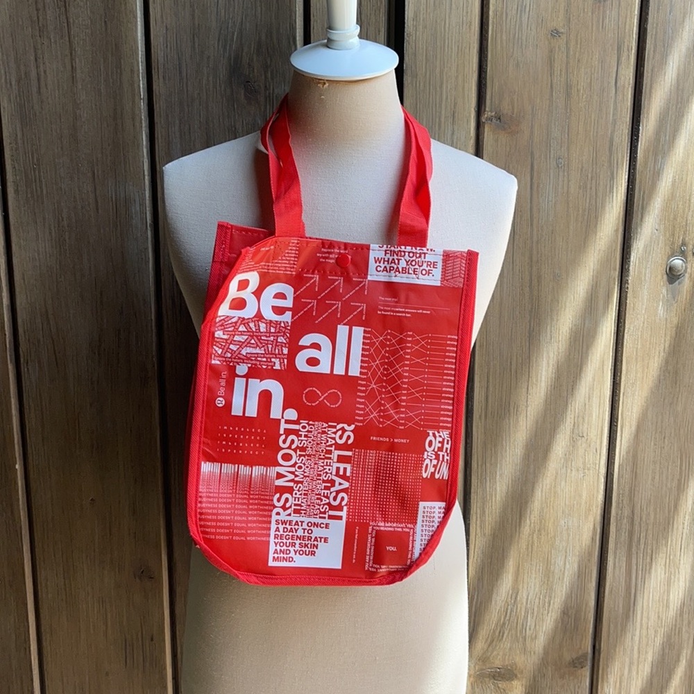 Lululemon • red shopping bag